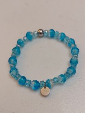 Nogu Artisan Handblown Aquamarine Ice Firefly Glass Snow Globe Stretch Bracelet